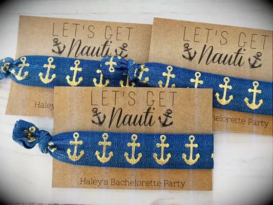 Navy wristband with gold anchors