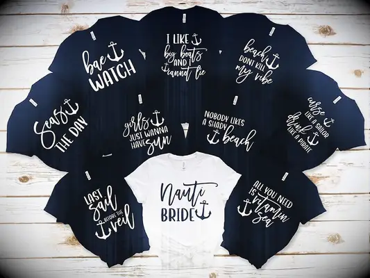 Navy shirts for bridesmaids and white shirt for bride with nautical sayings