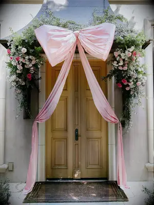 Oversized bow doorway decoration 