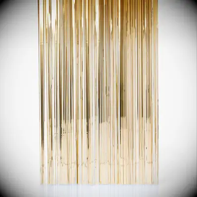 Gold fringe backdrop bridal shower decor