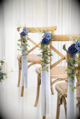 Floral chair decorations for bridal shower