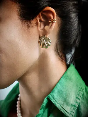 Gold seashell earrings for your beach bach party attire