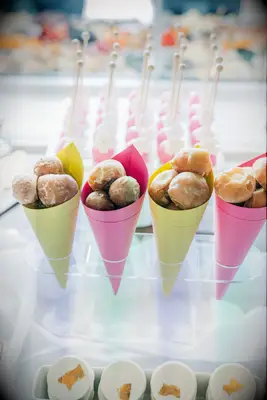 Cones of donut holes dessert idea for bridal shower. 