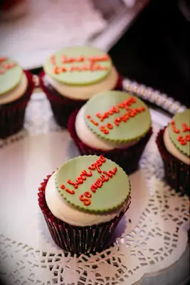 Cupcakes with a custom topper. 