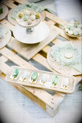 Pale green dessert table for a bridal shower. 