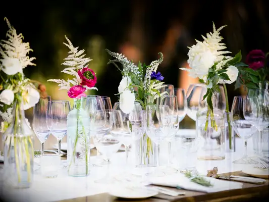 Delicate pale fern floral centerpieces.