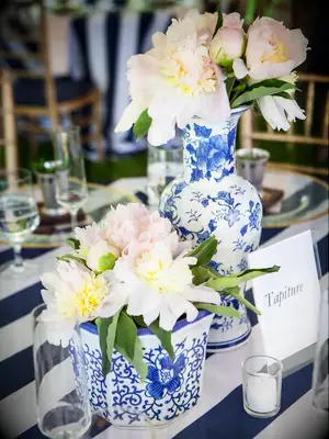 Blue china floral centerpieces.