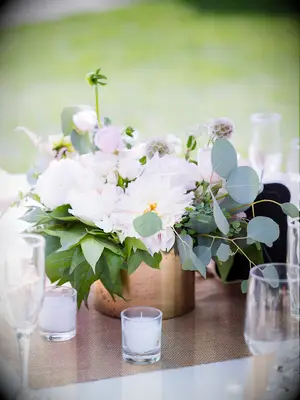A lovely spray of white flowers and greenery.