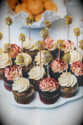 Carrot cake and red velvet bridal shower cupcakes with gold sparkler detail