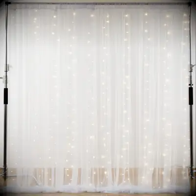 White tulle fairly light bridal shower backdrop