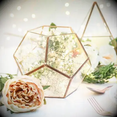 Glass geometric terrarium engagement party decoration