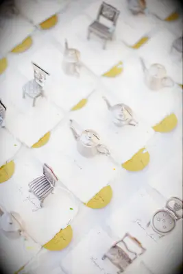 bridal shower decoration idea miniature chairs and tea pot figurine escort cards