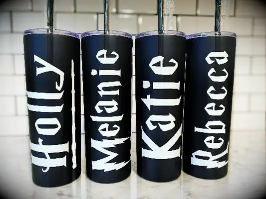 Personalized black tumblers in white HP font