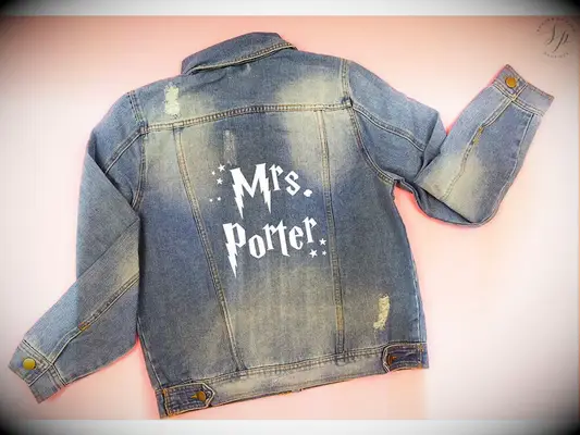 Denim jacket with personalized name in white HP font