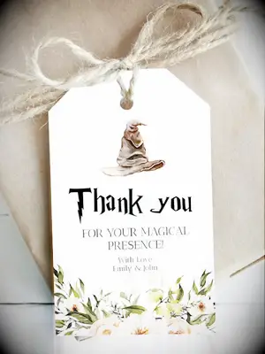 Thank you tag with sorting hat above message and floral details on bottom