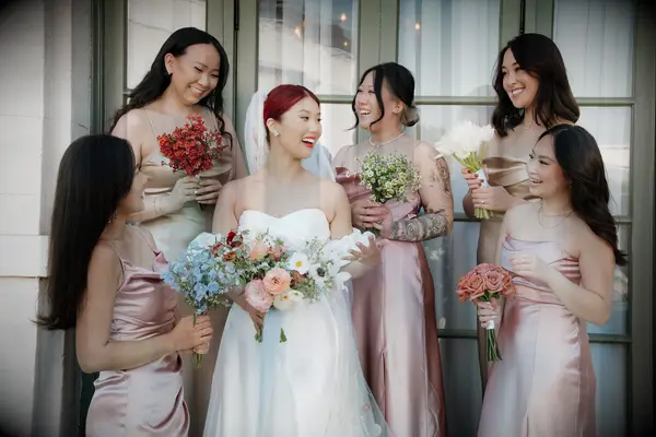 Bride posing with Bridesmaids