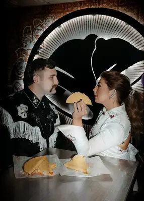 Couple eating Taco Bell at vow renewal