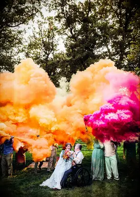 Colorful smoke bombs at vow renewal