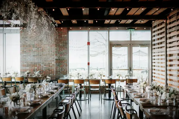 Inside cozy red brick restaurant venue