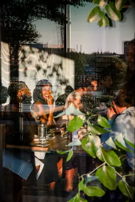 guests seated at a micro-wedding reception in a restaurant