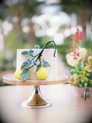 single-tier wedding cake with lemon decoration