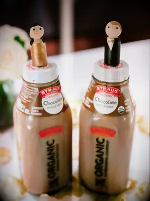 bottles of chocolate milk with cake toppers
