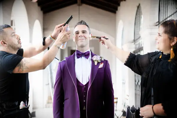 groom getting ready for wedding day