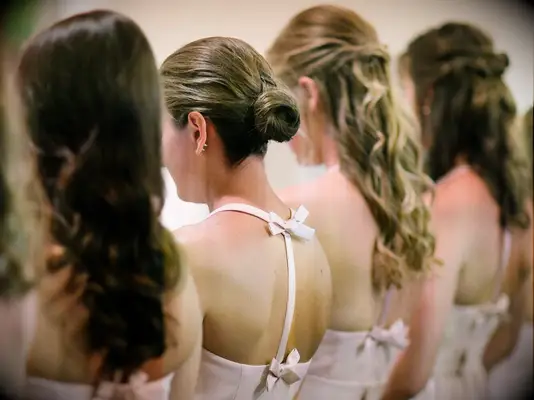 Bridesmaid updo high ballerina bun