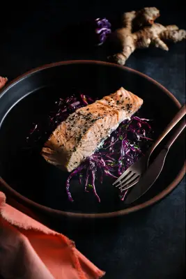 Salmon and purple coleslaw cannabis-infused meal.