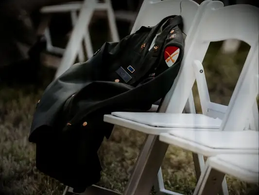 how to honor loved one at wedding lay jacket over empty seat