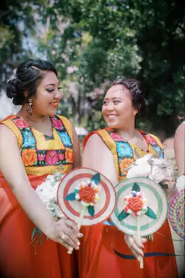 Bridesmaids in traditional Mexican dresses