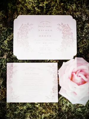 alice in wonderland wedding invitations moss flatlay