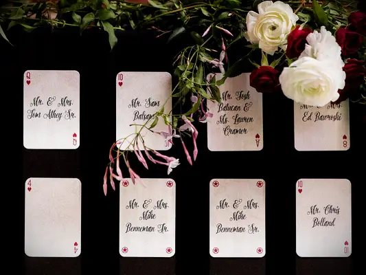 alice in wonderland wedding ideas playing card escort cards