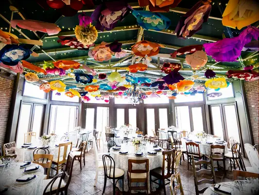 alice in wonderland wedding ideas colorful flowers on ceiling
