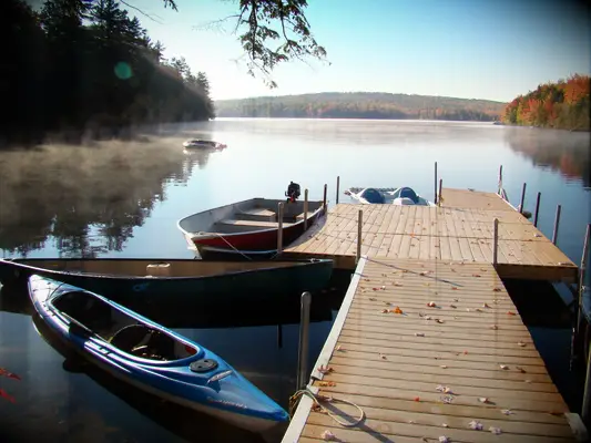 private boat dock at rustic cabin wedding rental home in maine
