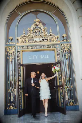 Couple leaving city hall