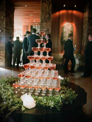 Pink champagne used for champagne tower centerpiece. 