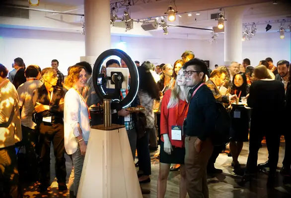 Guests using open-air photo booth