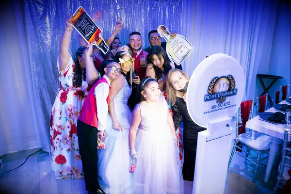 Guests using open-air photo booth at an event