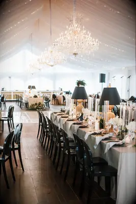 Gorgeous tented wedding reception space with chandeliers