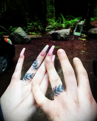 Matching vine tattoos