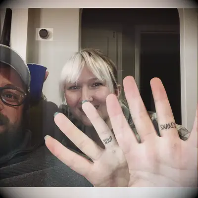 Matching inside joke tattoos