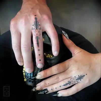 Matching sword tattoos