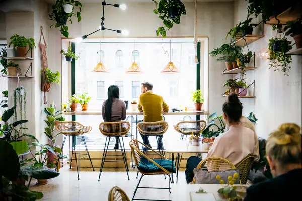 A couple enjoys a trip to a coffee shop