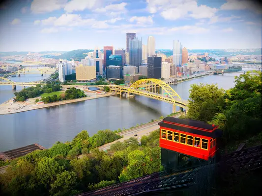 Red funicular trolley overlooking Pittsburgh