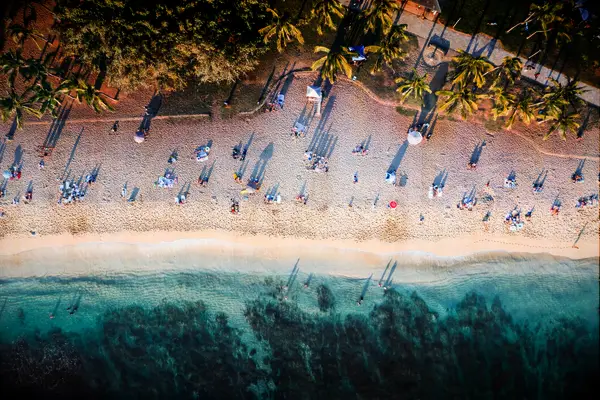 Above Waikiki beach crowded at sunset, Hawaii 
