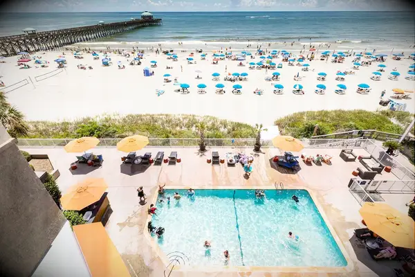 Tides Folly Beach view of beach and hotel pool