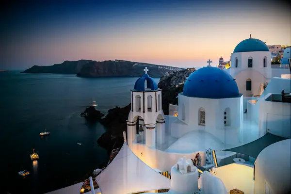 The iconic blue domes in Santorini, Greece