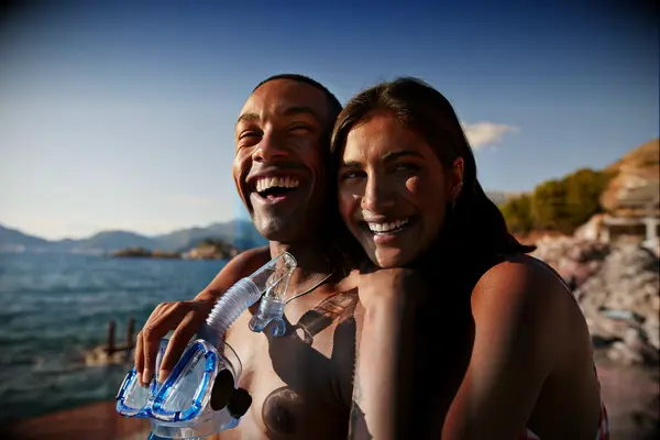 A happy couple on a beach vacation